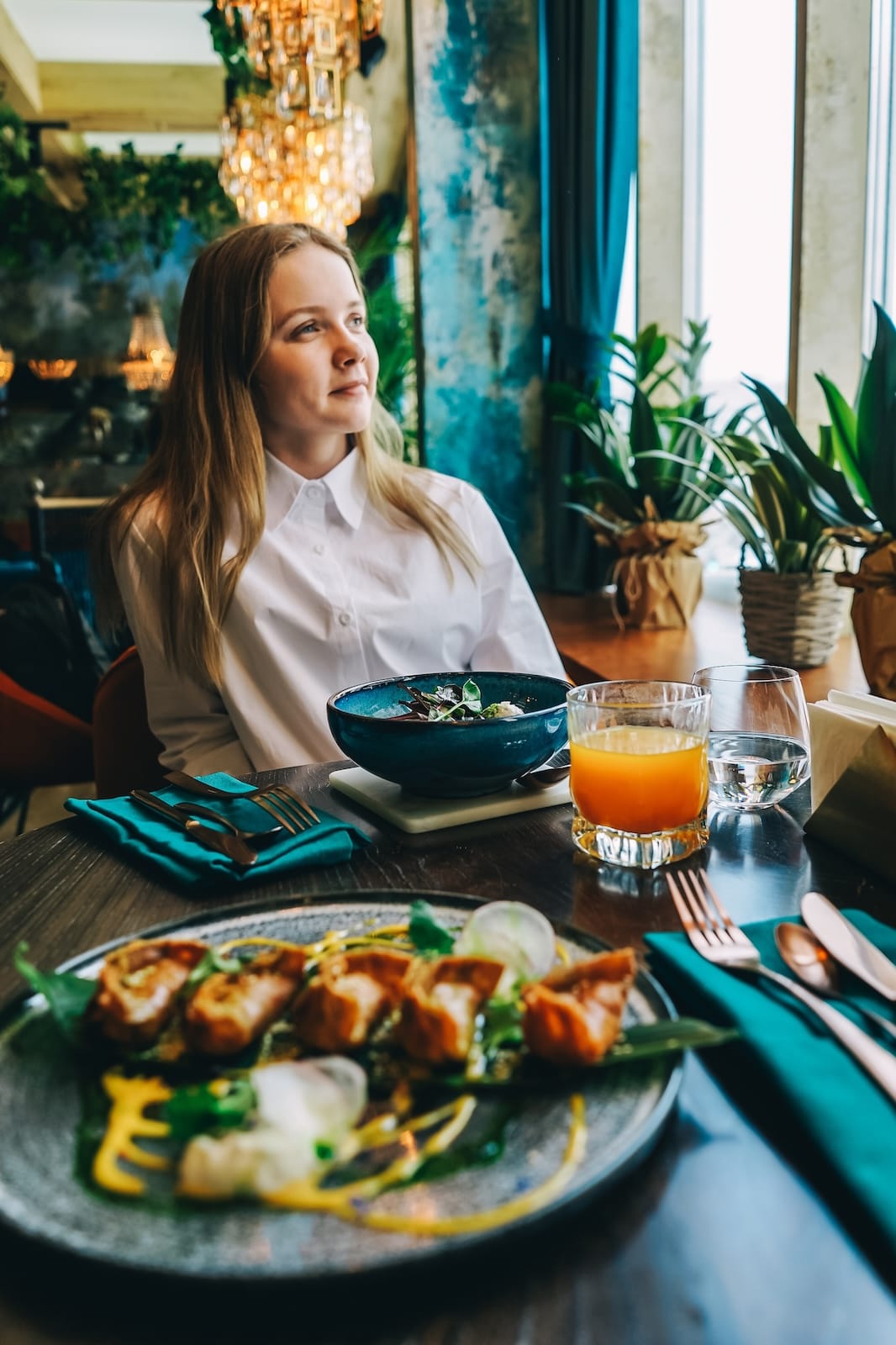 young-beautiful-woman-have-dinner-in-noura-restaurant